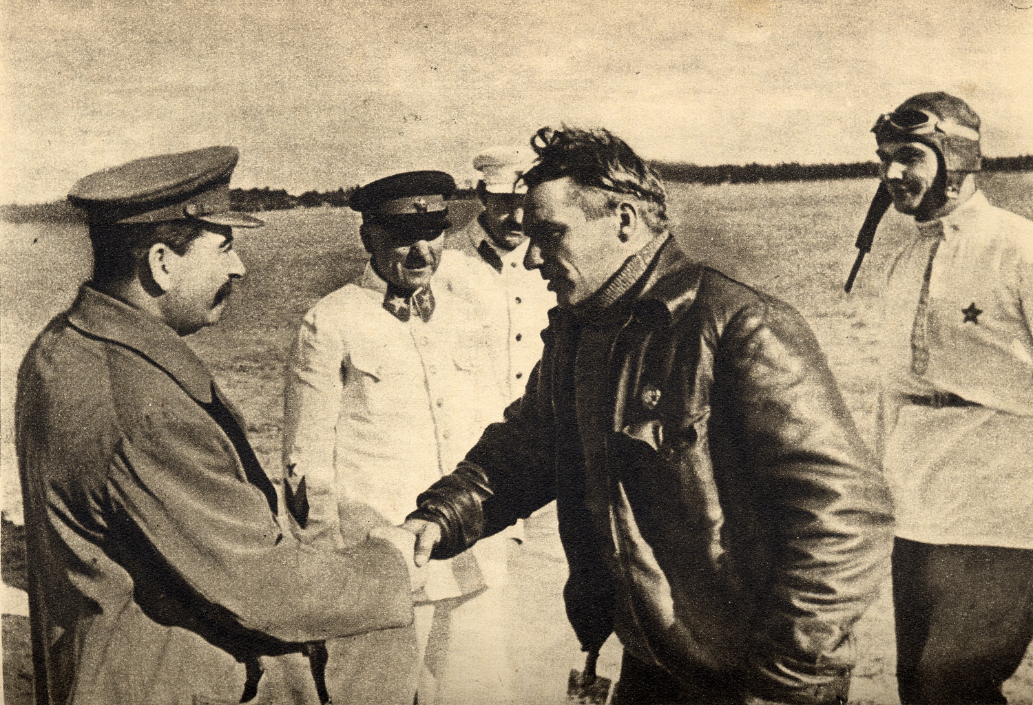 Chkalov,_Stalin_and_Belyakov._August_10,_1936.jpg